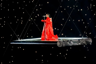 Rihanna dons custom Alaia coat for Super Bowl performance, reveals pregnancy